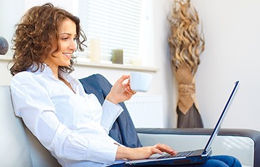 woman reads about renewing an expired real estate license