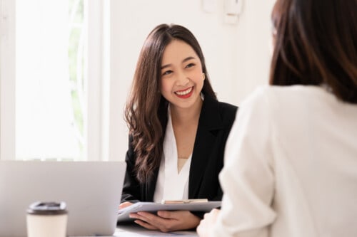 real estate agent smiling