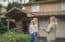real estate agent with clients