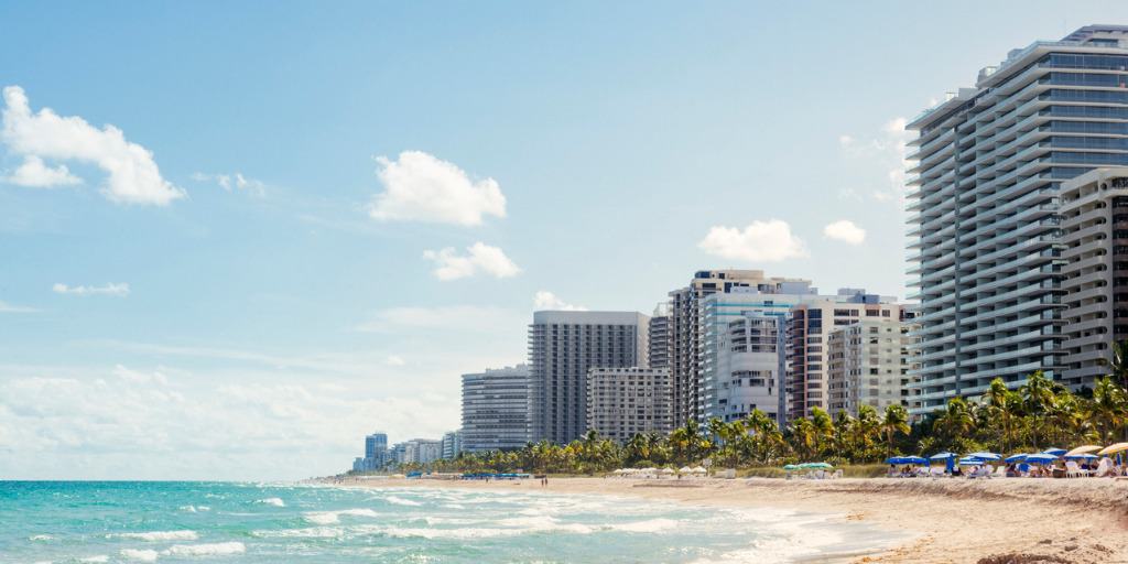 beach view of condos on sunny day