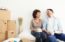 man and woman laughing in rental apartment