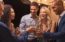 friends toasting at a networking event