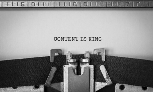 Text Content is King typed on retro typewriter