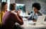 real estate agent working with clients