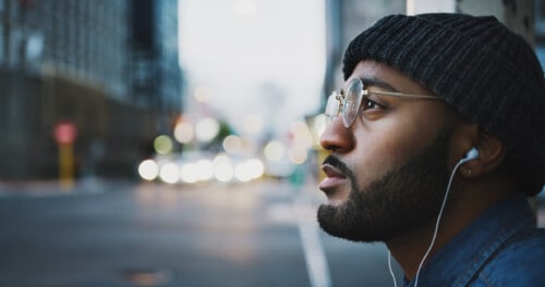 Millennial on busy city street