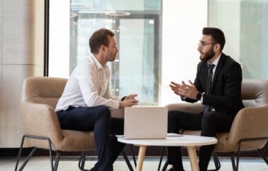 two real estate agents negotiating