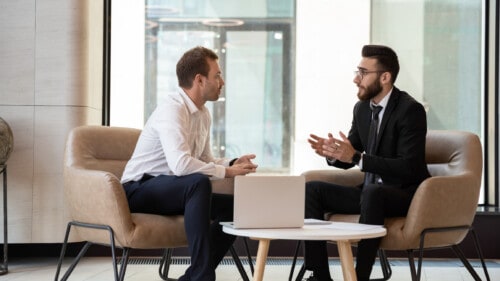 two real estate agents negotiating