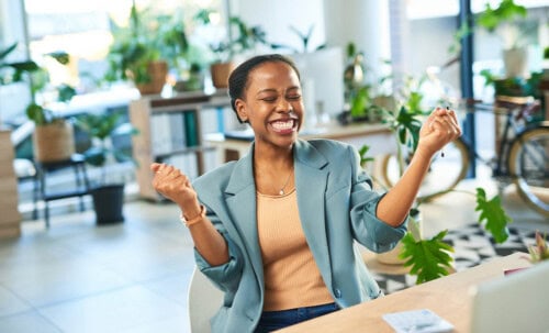 Real estate agent excited about how much she makes per sale