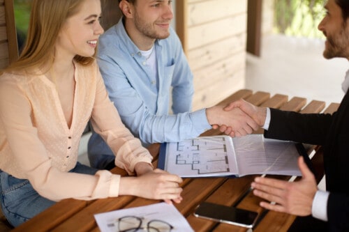 real estate agent with couple