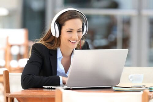 Woman on a laptop renewing her CT real estate license