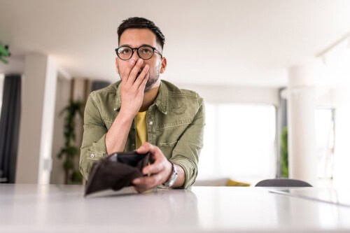 real estate agent concerned about having an empty wallet due to poor budgeting