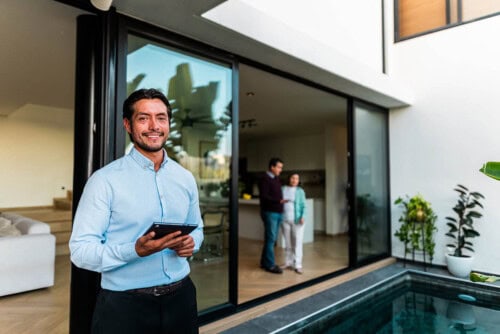 real estate agent shows home
